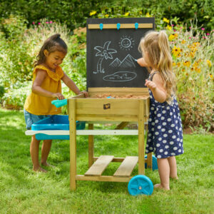 two girls playing outisde on chalkboard