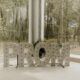 white wooden 'Prom' sign on white surface with big bright windwos behind