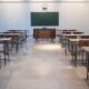 brown wooden table and chairs in school